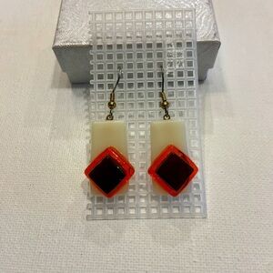 Stylish Orange and Black Geometric Design on a Cream Background Earrings